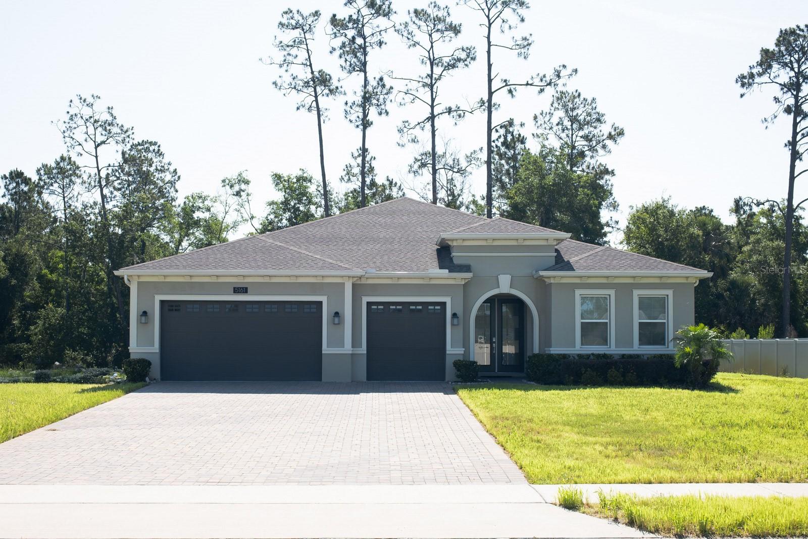 Single Family Residence em OVIEDO, FL - Daniel Dourado
