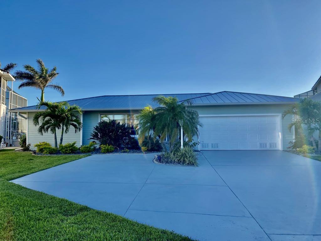 Single Family Residence em PUNTA GORDA, FL - Daniel Dourado