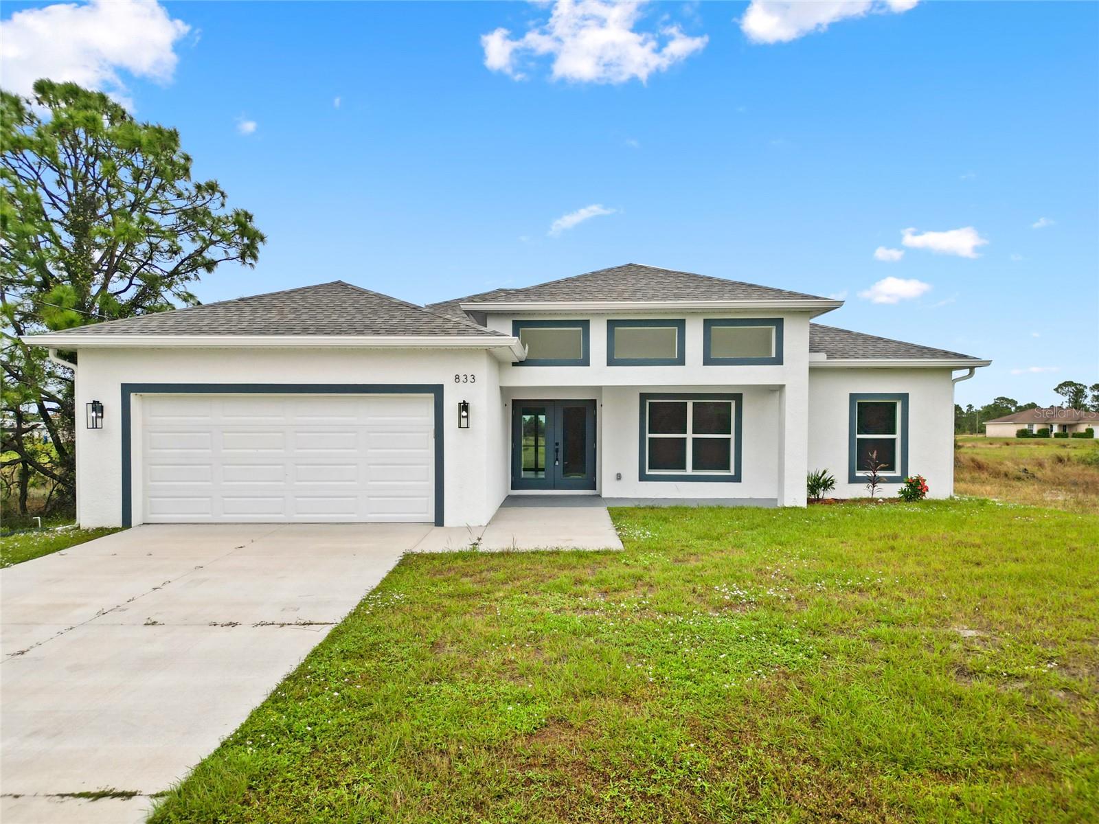 Single Family Residence in LEHIGH ACRES, FL - Daniel Dourado