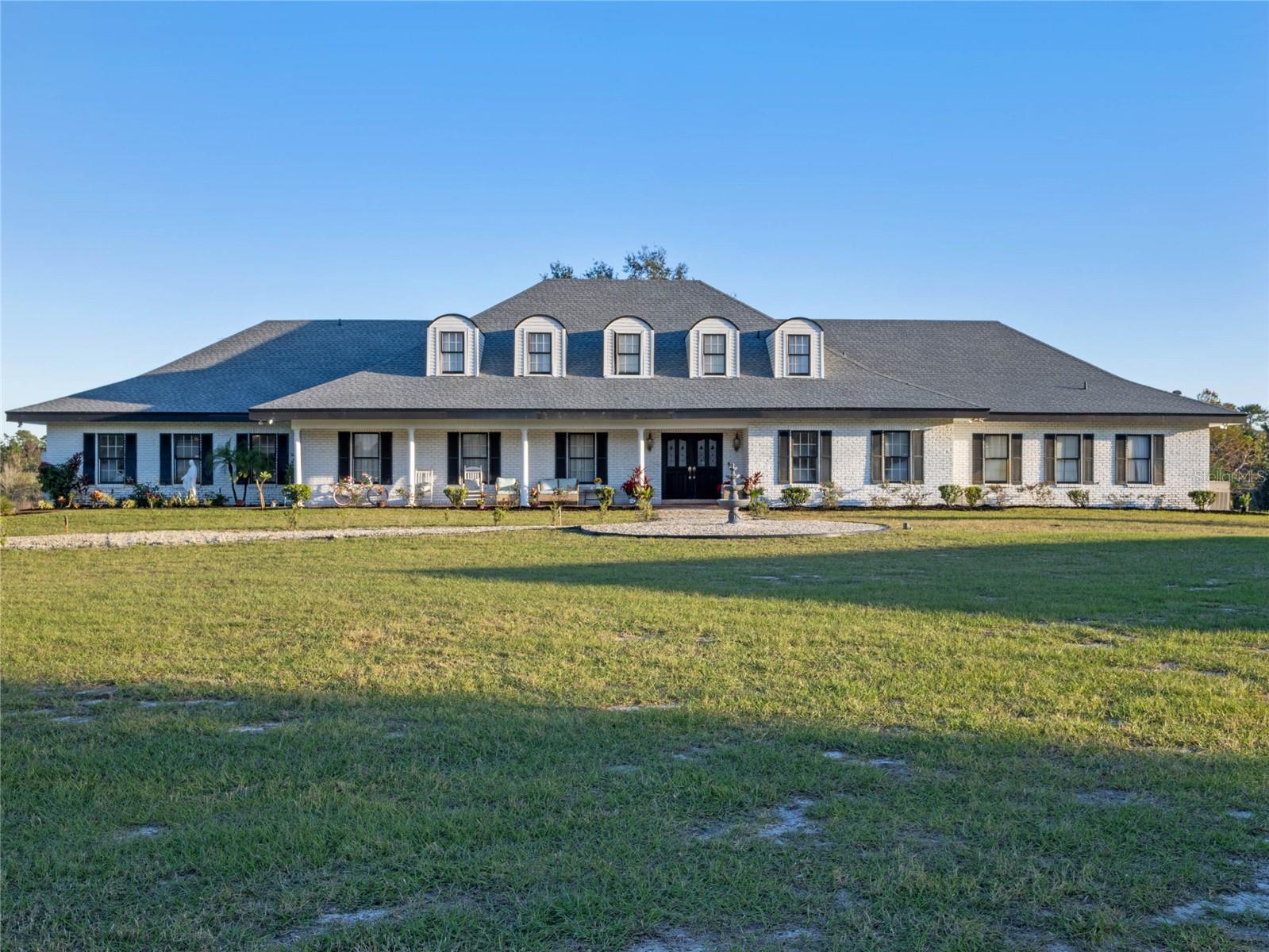 Single Family Residence em OVIEDO, FL - Daniel Dourado