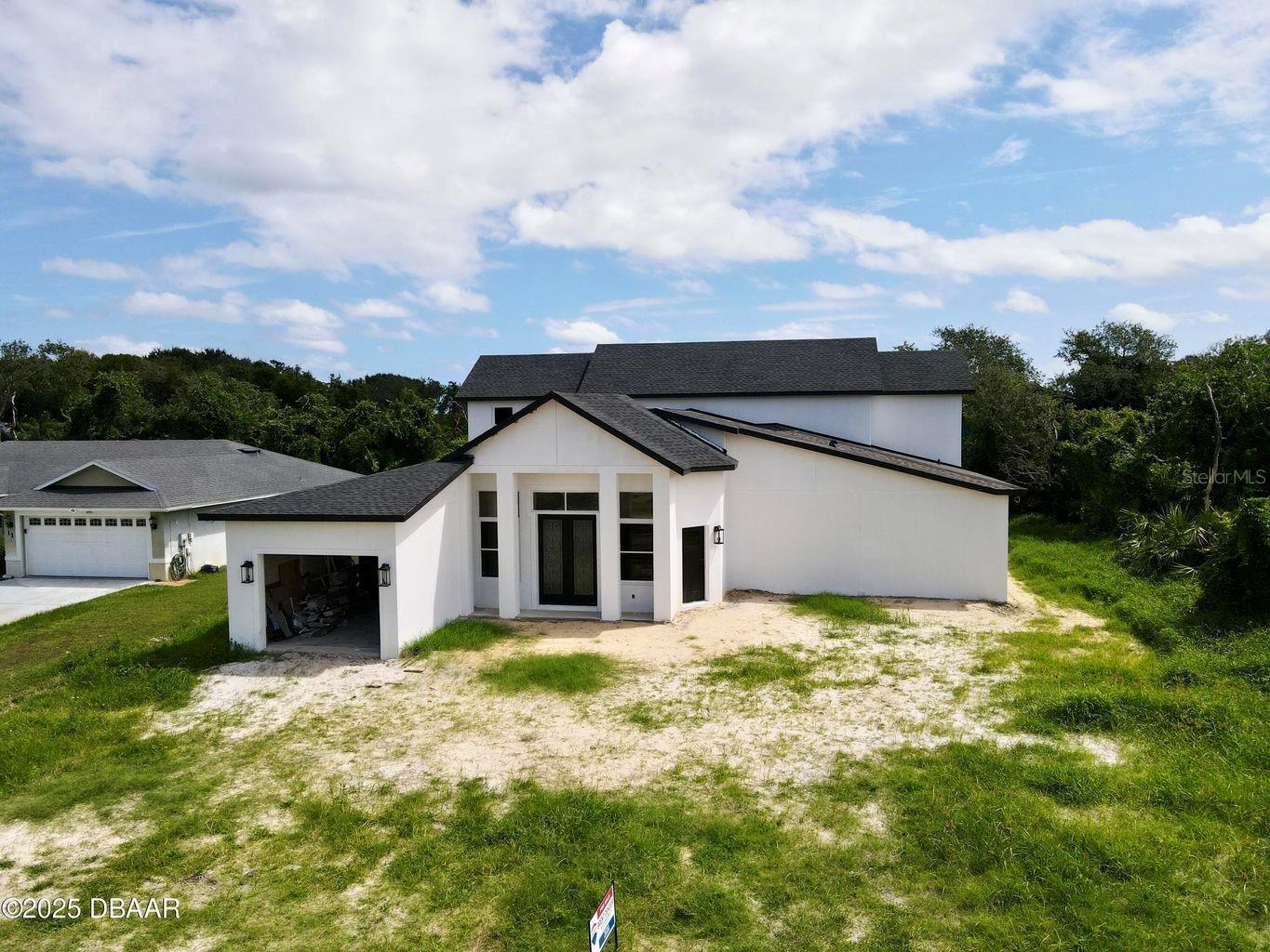 Single Family Residence in PALM COAST, FL - Daniel Dourado