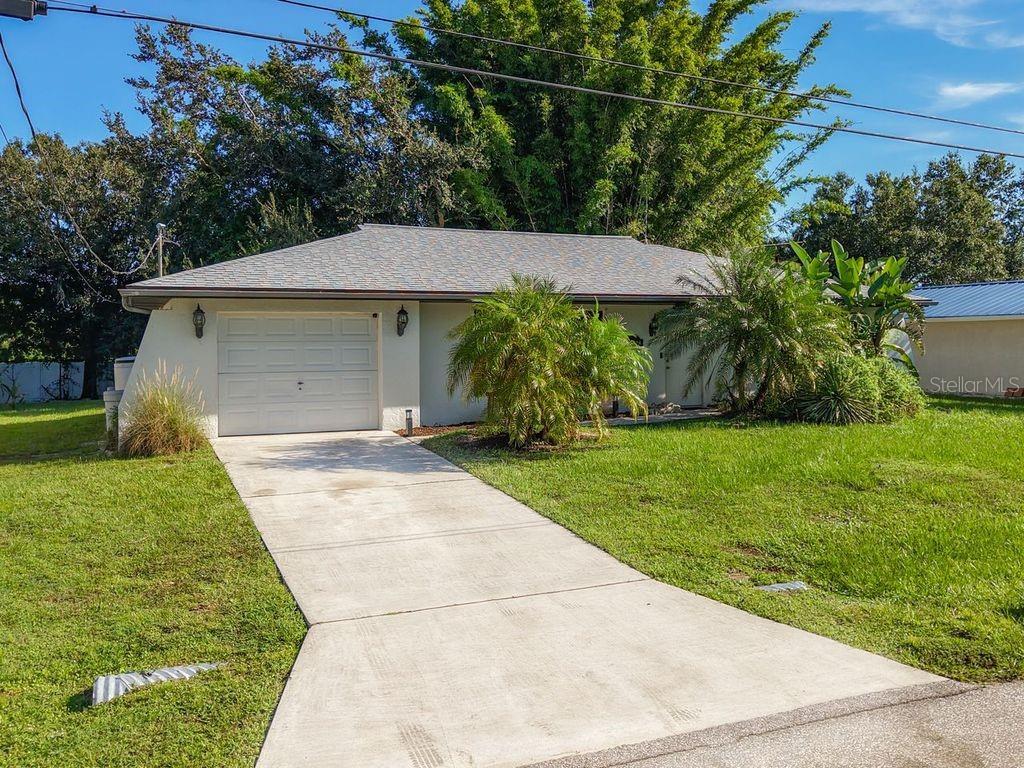 Single Family Residence em PUNTA GORDA, FL - Daniel Dourado