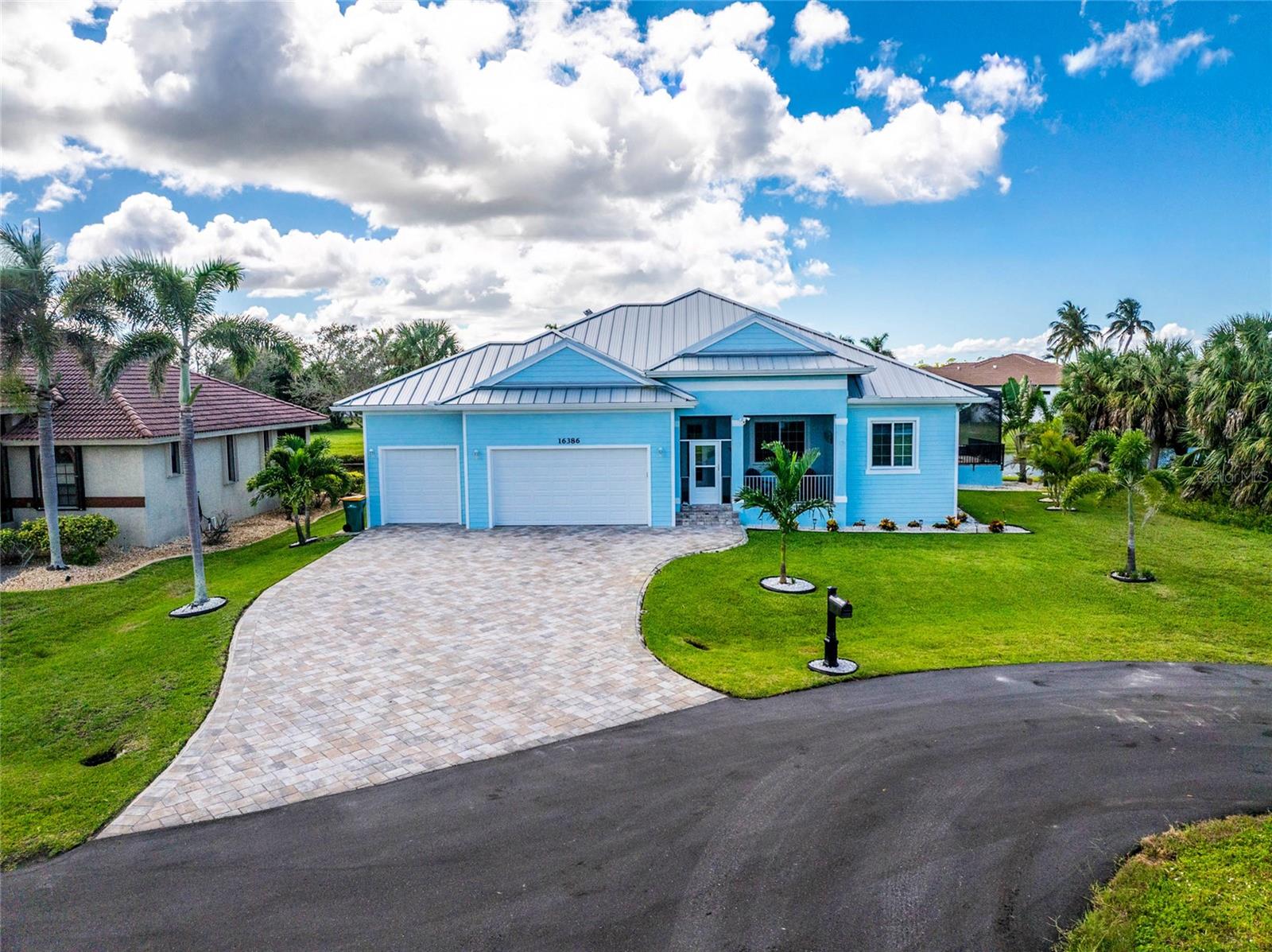 Single Family Residence em PUNTA GORDA, FL - Daniel Dourado