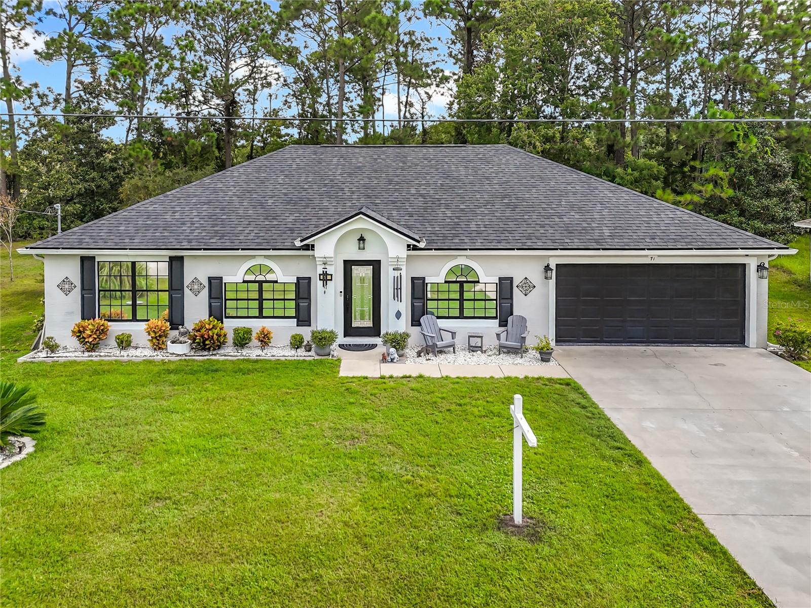 Single Family Residence in PALM COAST, FL - Daniel Dourado