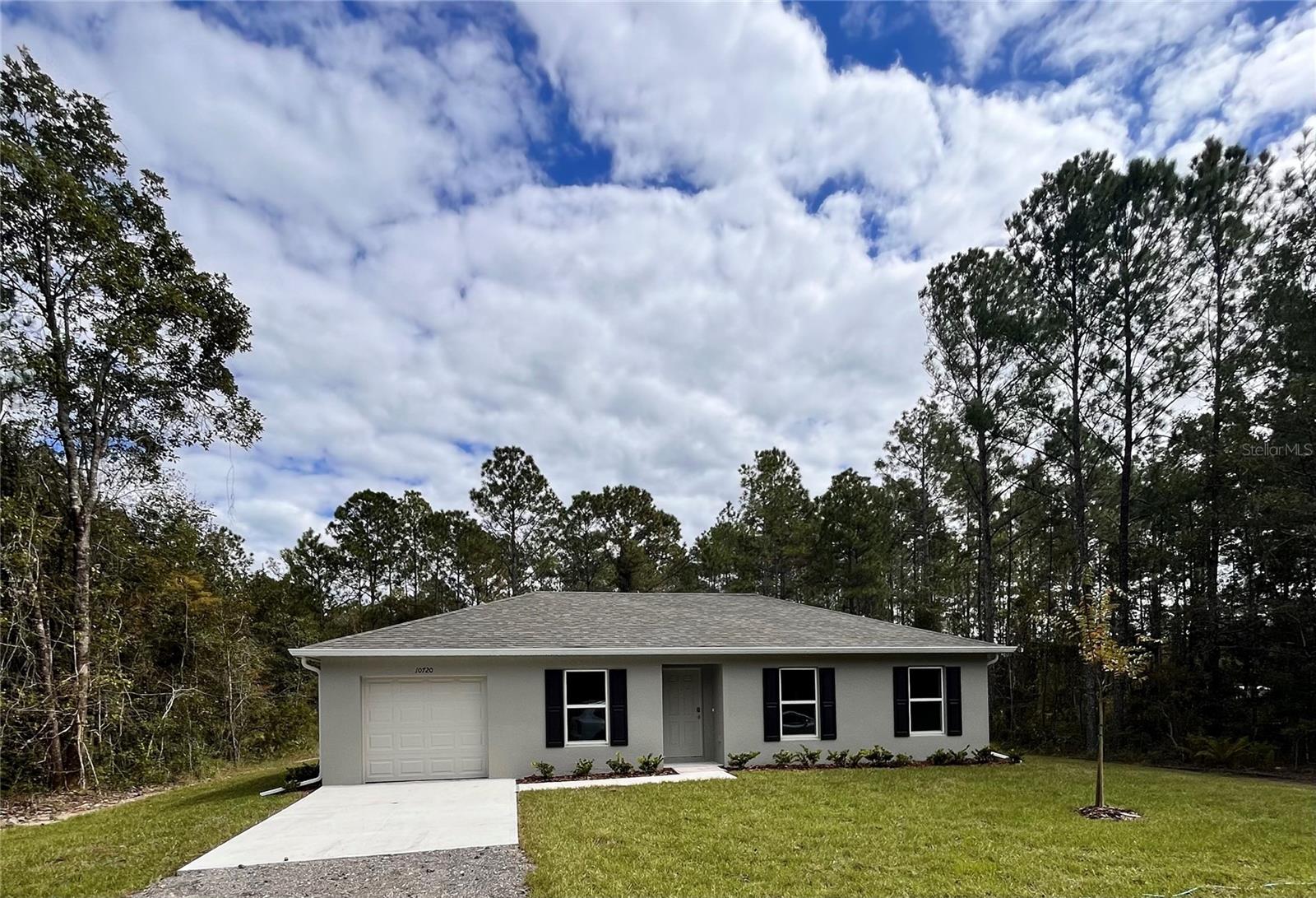 Single Family Residence em HASTINGS, FL - Daniel Dourado