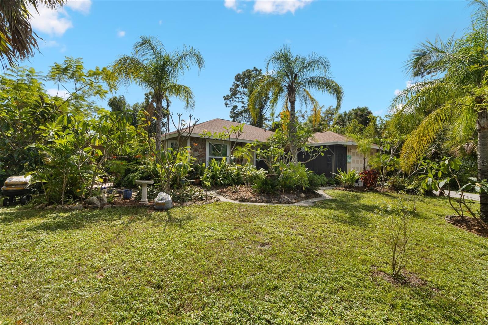 Single Family Residence em PORT CHARLOTTE, FL - Daniel Dourado