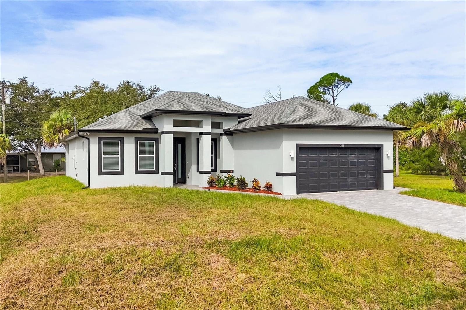 Single Family Residence em PORT CHARLOTTE, FL - Daniel Dourado