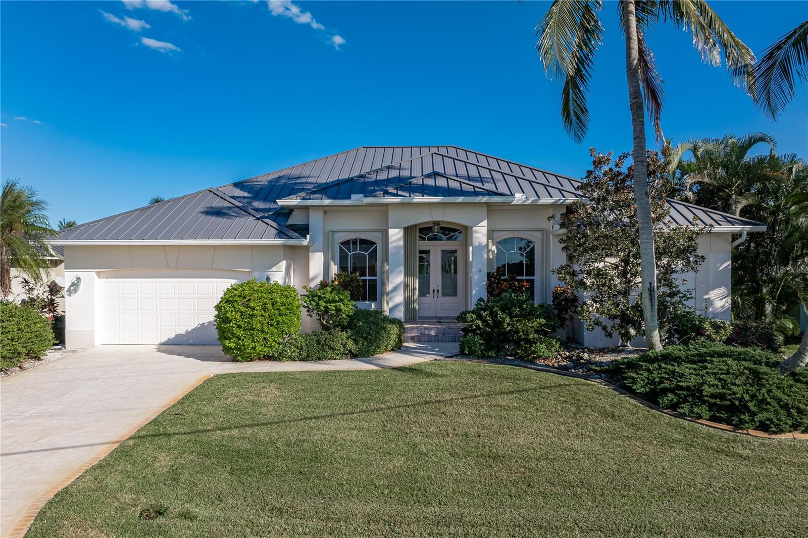 Single Family Residence em PUNTA GORDA, FL - Daniel Dourado