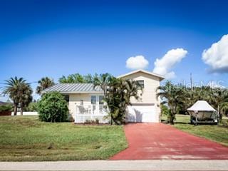 Single Family Residence em PUNTA GORDA, FL - Daniel Dourado