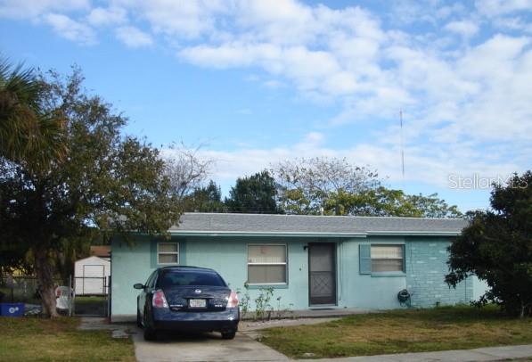 Single Family Residence em TITUSVILLE, FL - Daniel Dourado