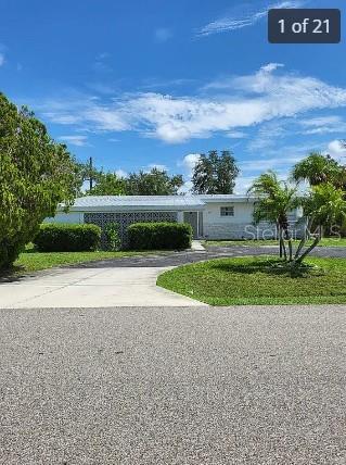 Single Family Residence em PORT CHARLOTTE, FL - Daniel Dourado