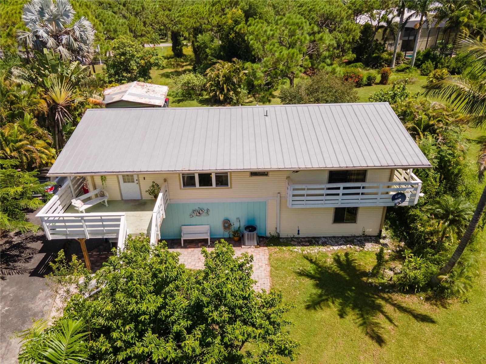 Single Family Residence em BOKEELIA, FL - Daniel Dourado