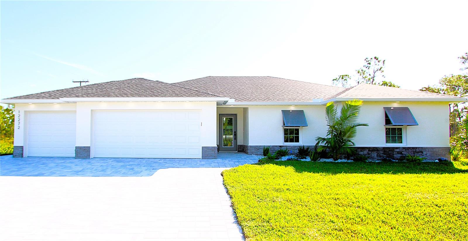 Single Family Residence em PUNTA GORDA, FL - Daniel Dourado