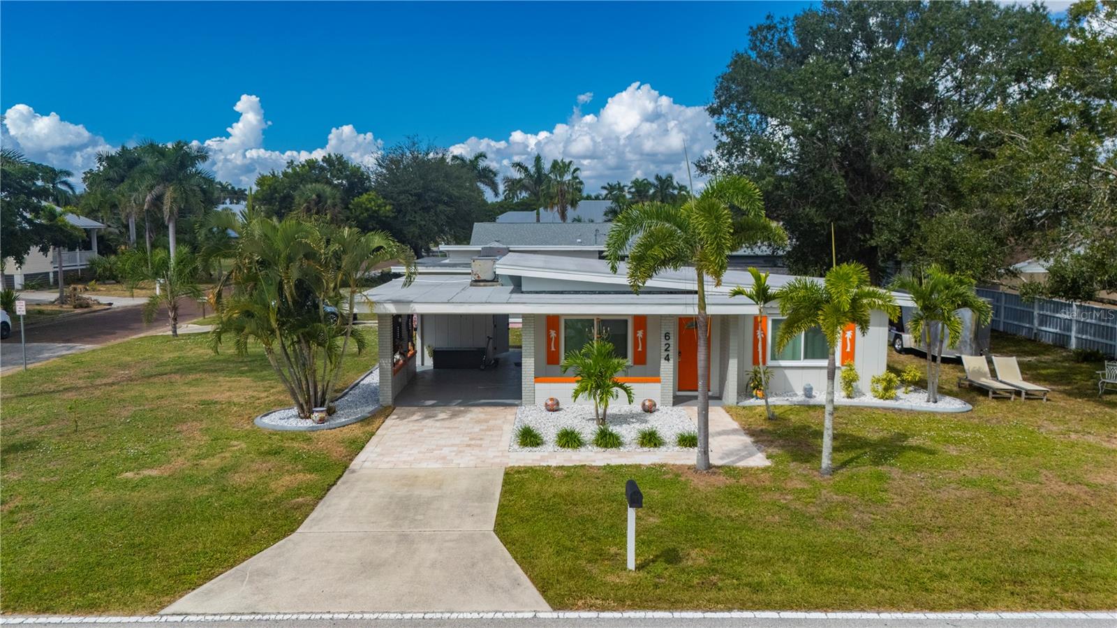 Single Family Residence em PUNTA GORDA, FL - Daniel Dourado