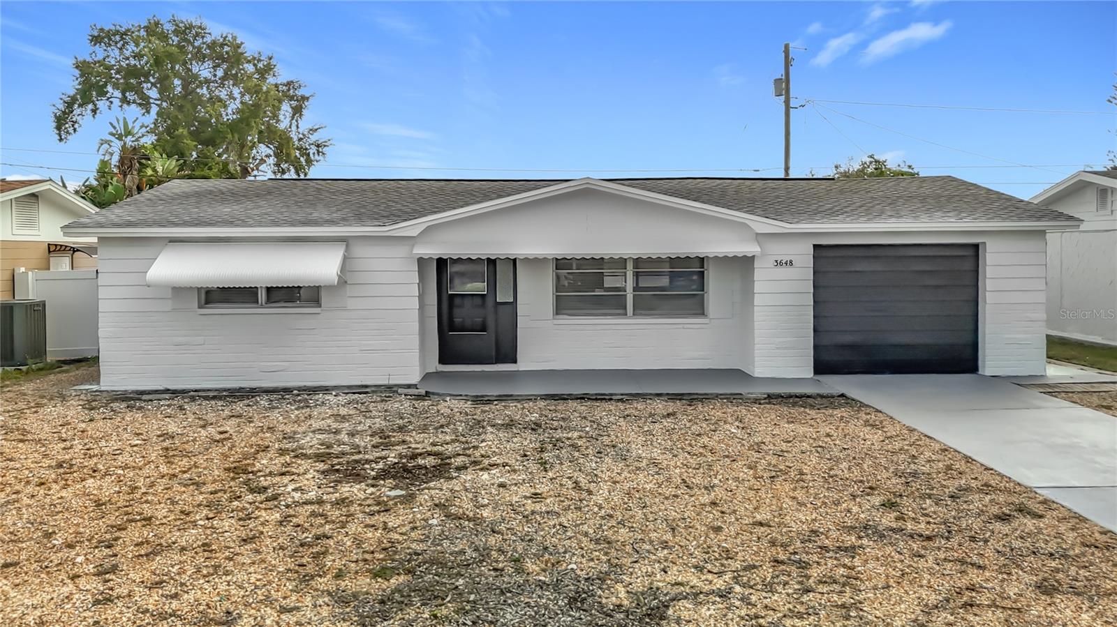 Single Family Residence em NEW PORT RICHEY, FL - Daniel Dourado