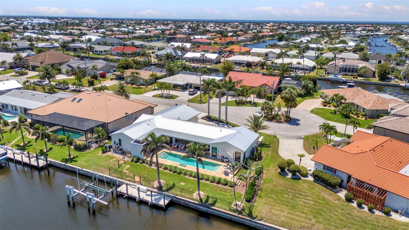 Single Family Residence em PUNTA GORDA, FL - Daniel Dourado