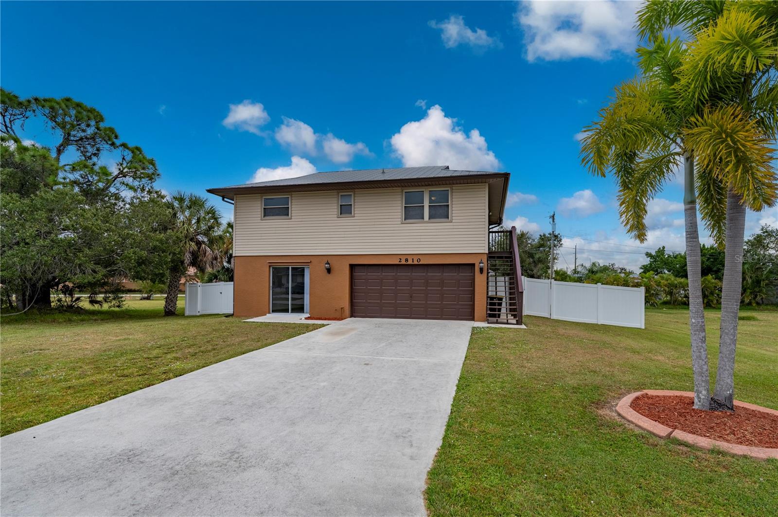Single Family Residence em PUNTA GORDA, FL - Daniel Dourado