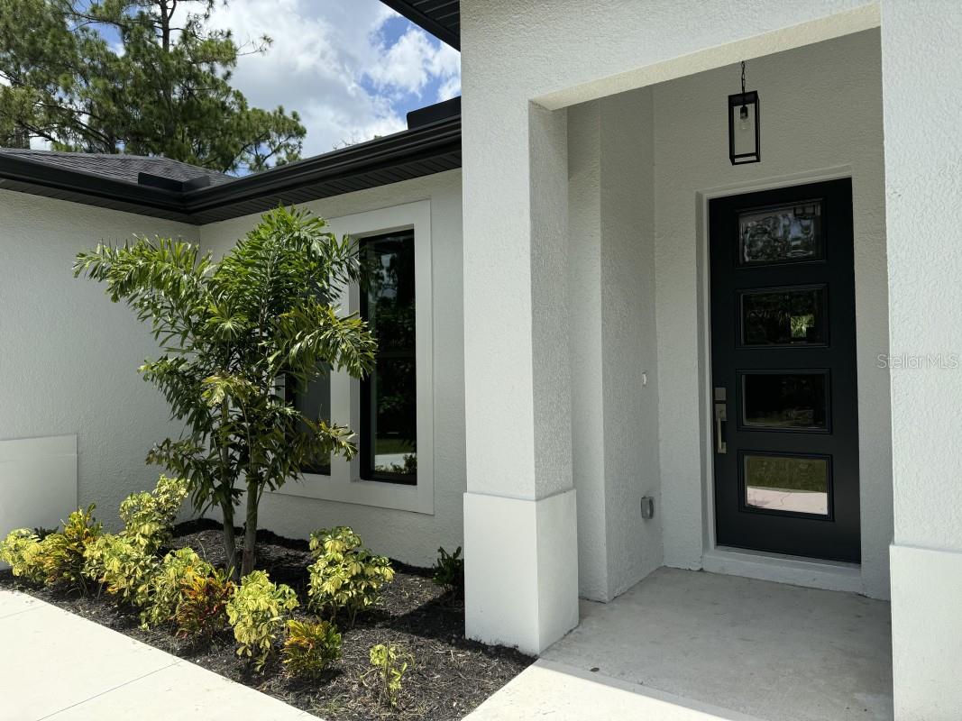 Single Family Residence em PORT CHARLOTTE, FL - Daniel Dourado