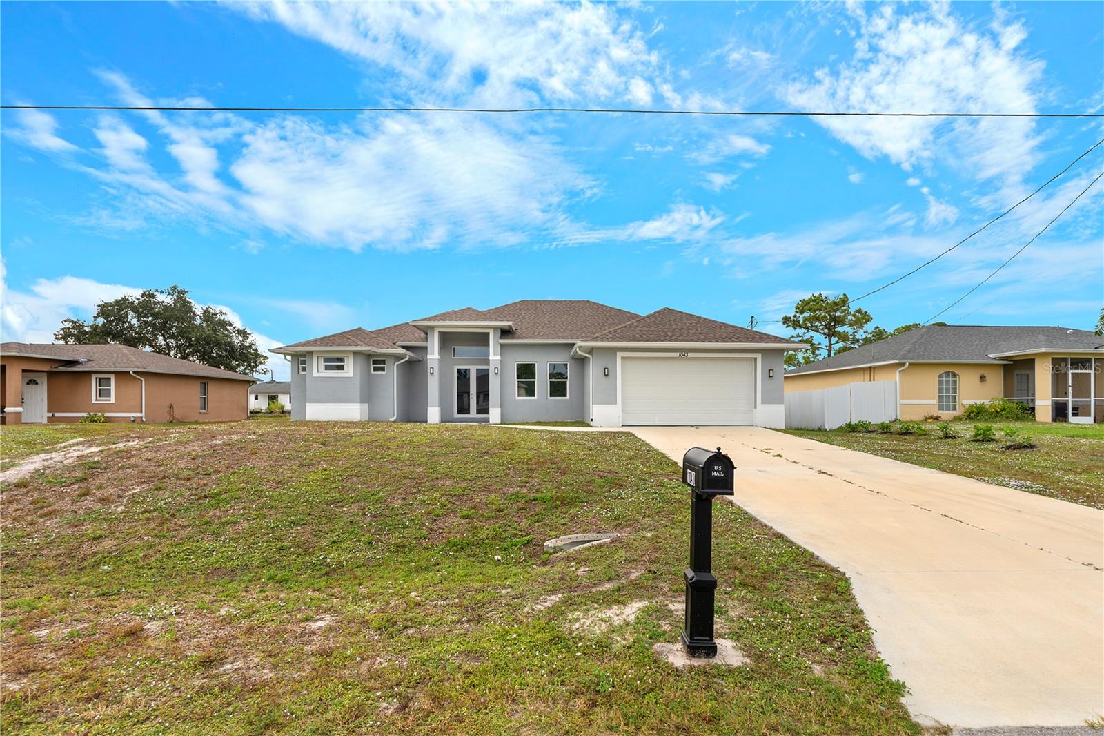 Single Family Residence in LEHIGH ACRES, FL - Daniel Dourado
