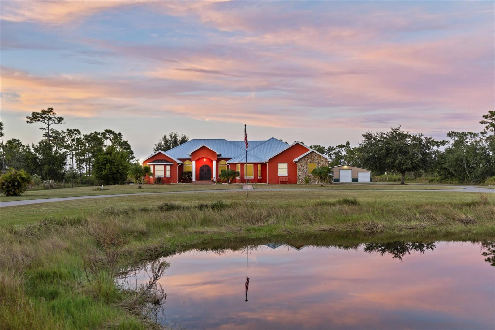 Single Family Residence em PUNTA GORDA, FL - Daniel Dourado