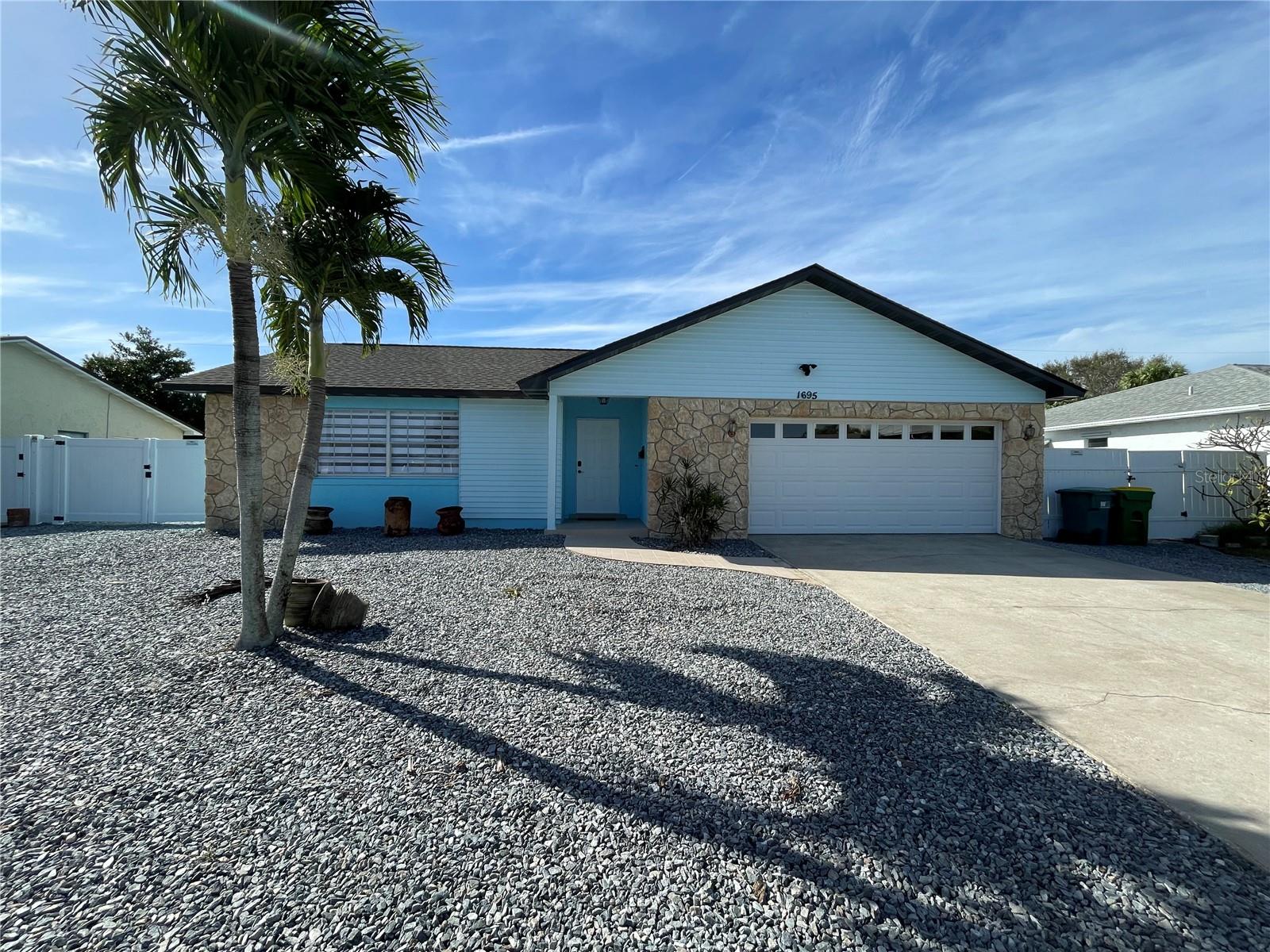 Single Family Residence em MERRITT ISLAND, FL - Daniel Dourado