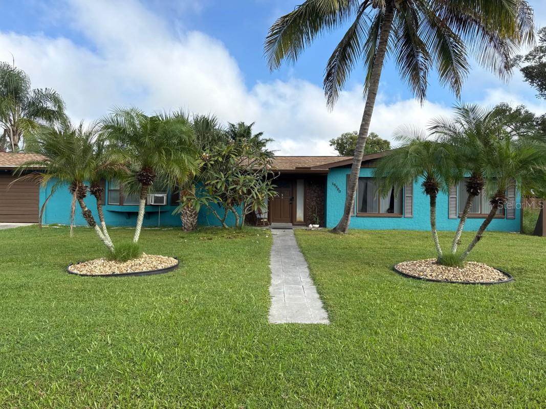 Single Family Residence em PUNTA GORDA, FL - Daniel Dourado