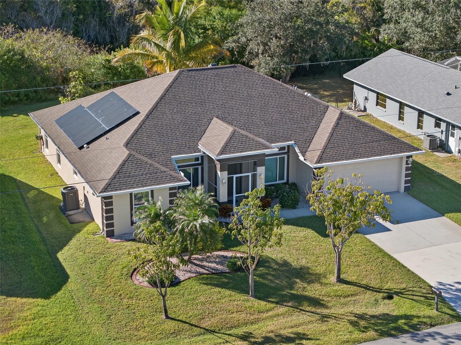Single Family Residence em PUNTA GORDA, FL - Daniel Dourado