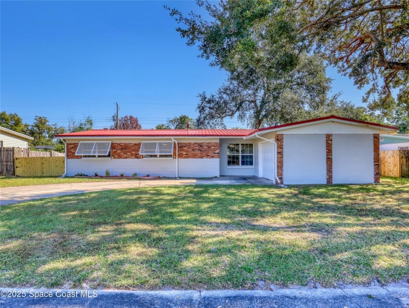 Single Family Residence em TITUSVILLE, FL - Daniel Dourado