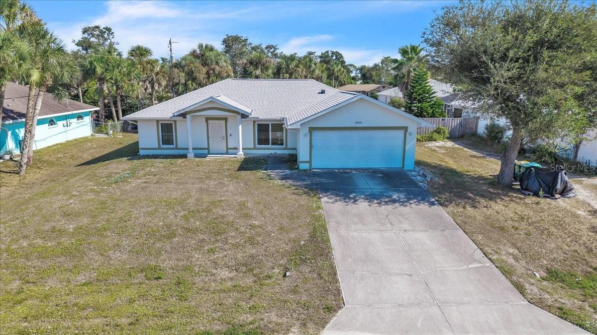 Single Family Residence em PORT CHARLOTTE, FL - Daniel Dourado