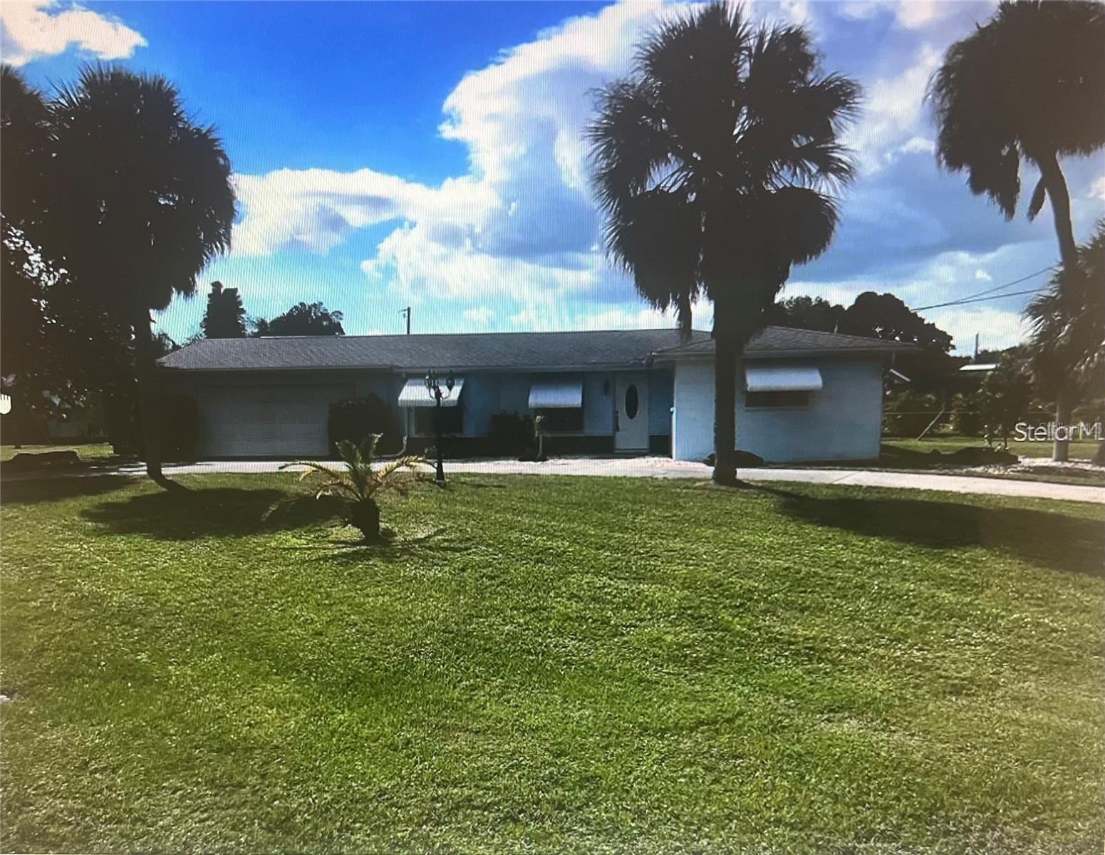 Single Family Residence em PORT CHARLOTTE, FL - Daniel Dourado