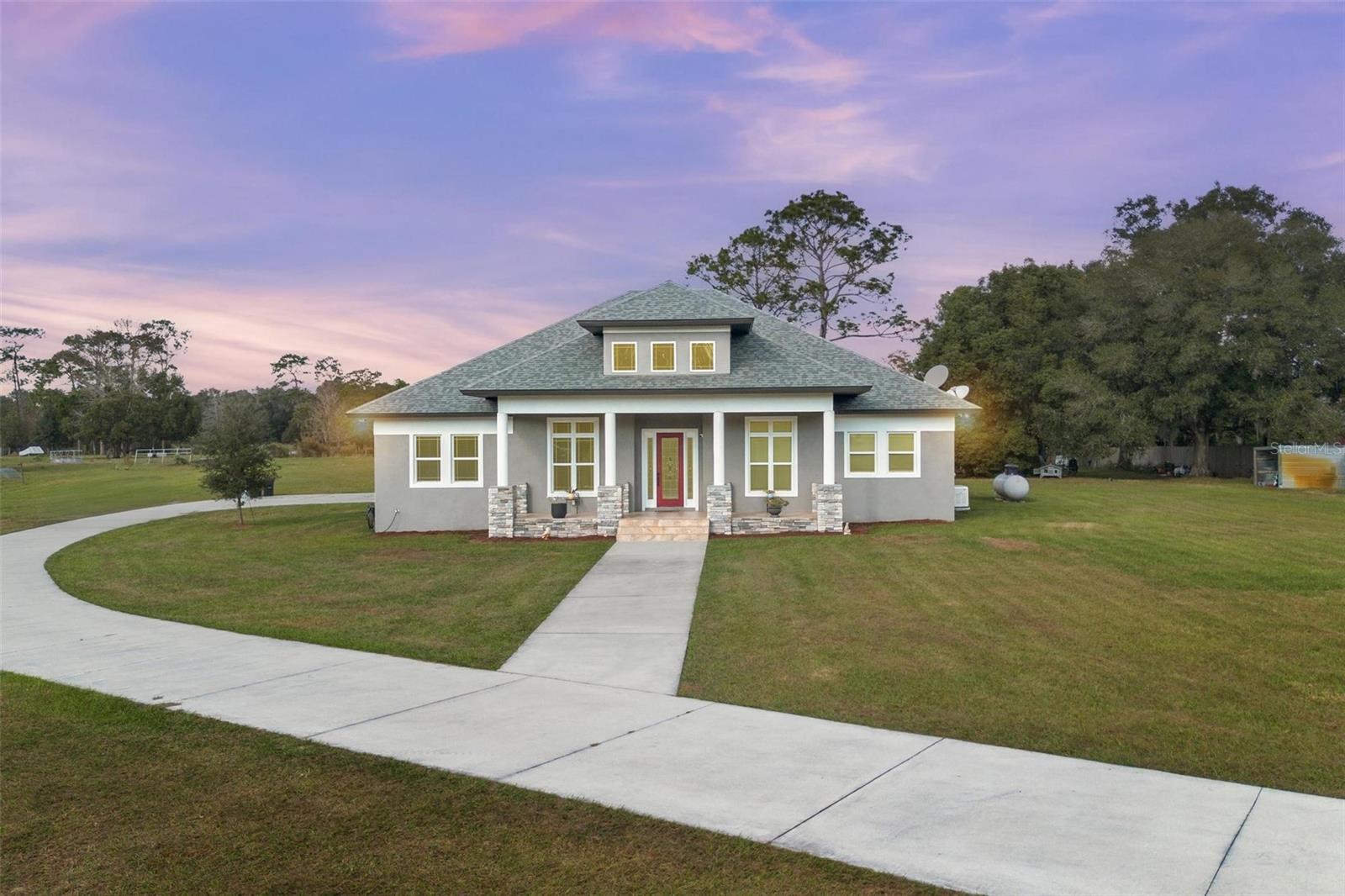 Single Family Residence em LAKE HELEN, FL - Daniel Dourado