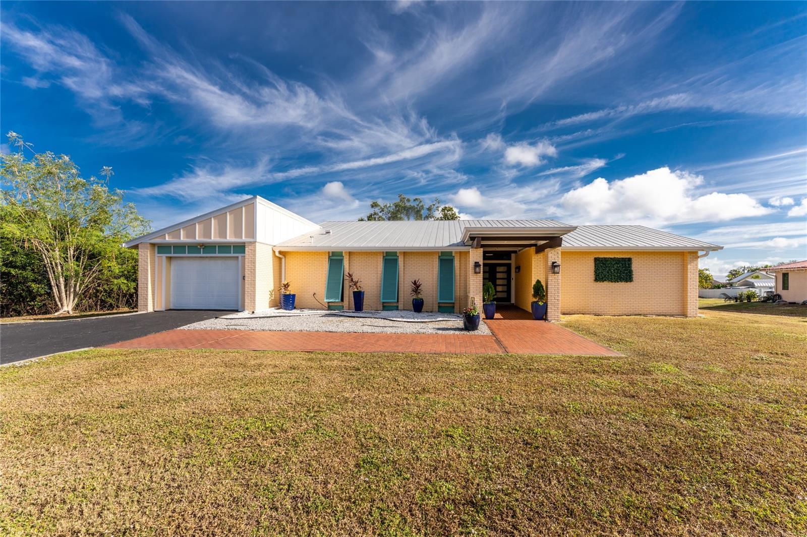 Single Family Residence em PUNTA GORDA, FL - Daniel Dourado