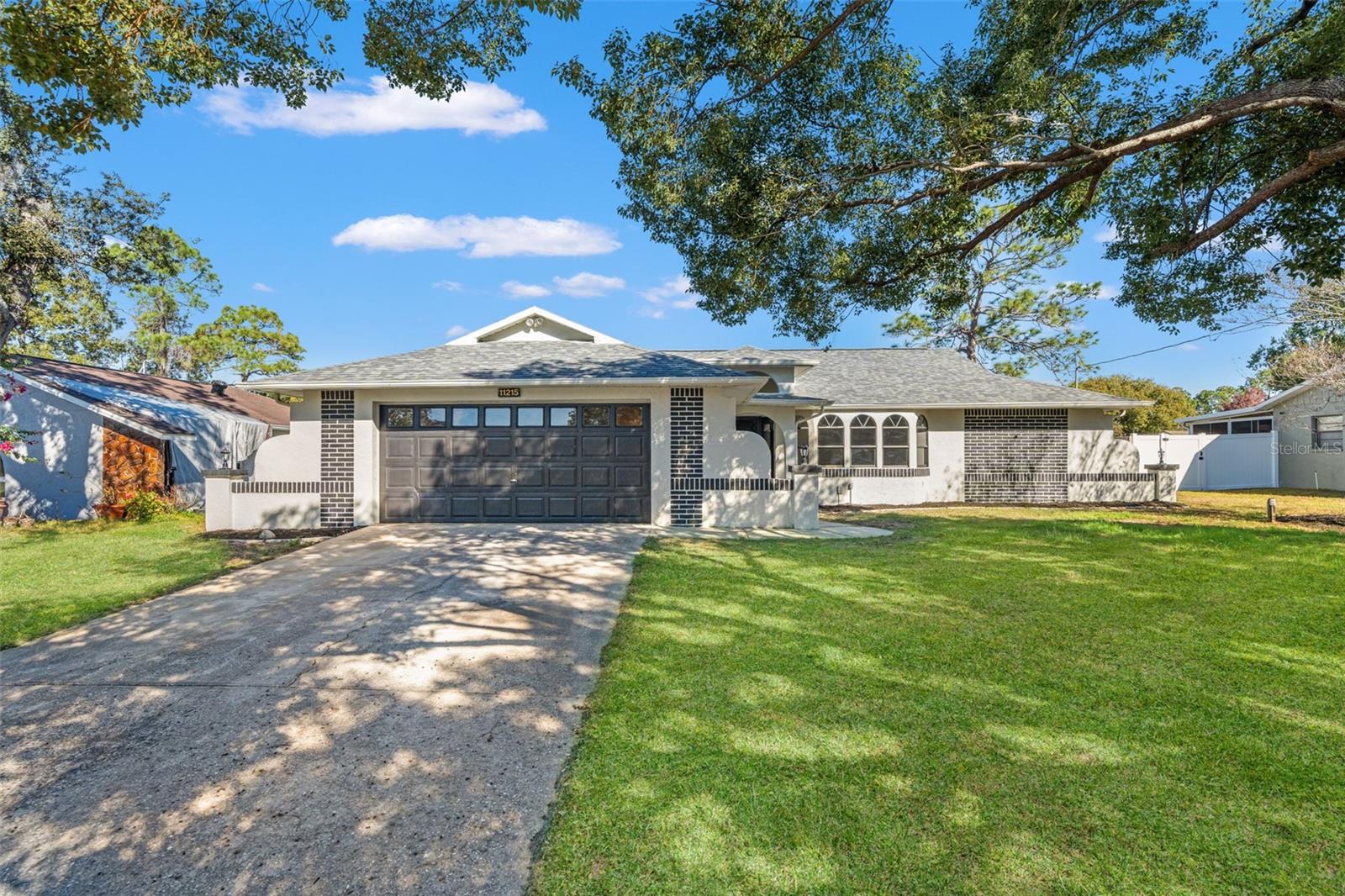 Single Family Residence em SPRING HILL, FL - Daniel Dourado