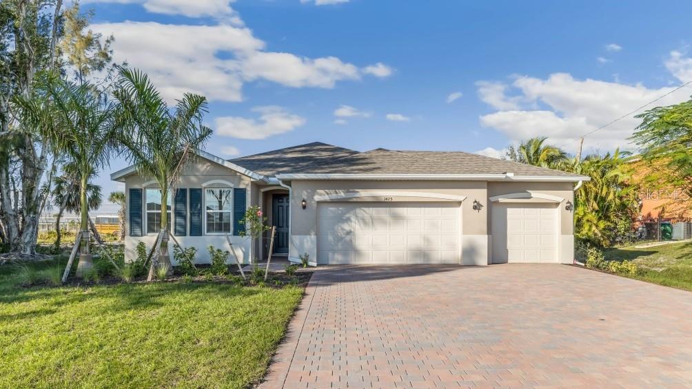Single Family Residence em PUNTA GORDA, FL - Daniel Dourado
