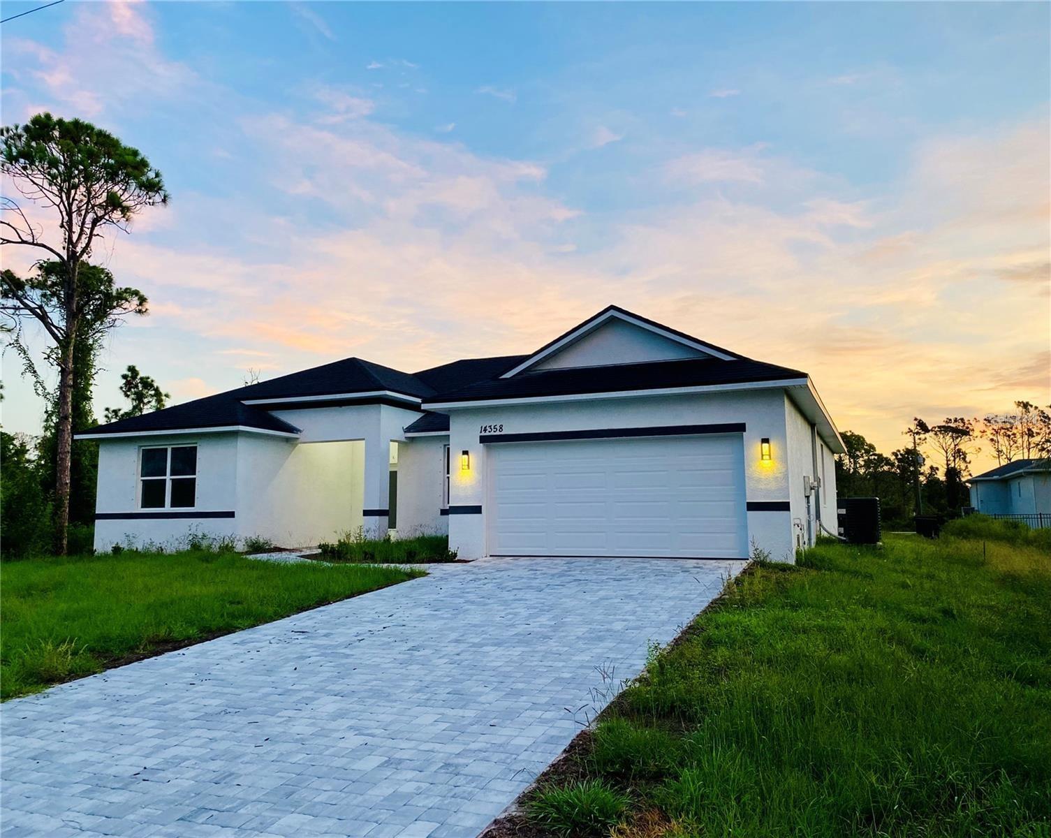 Single Family Residence em PORT CHARLOTTE, FL - Daniel Dourado