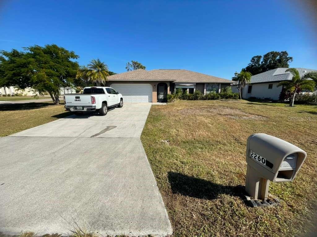 Single Family Residence em PUNTA GORDA, FL - Daniel Dourado