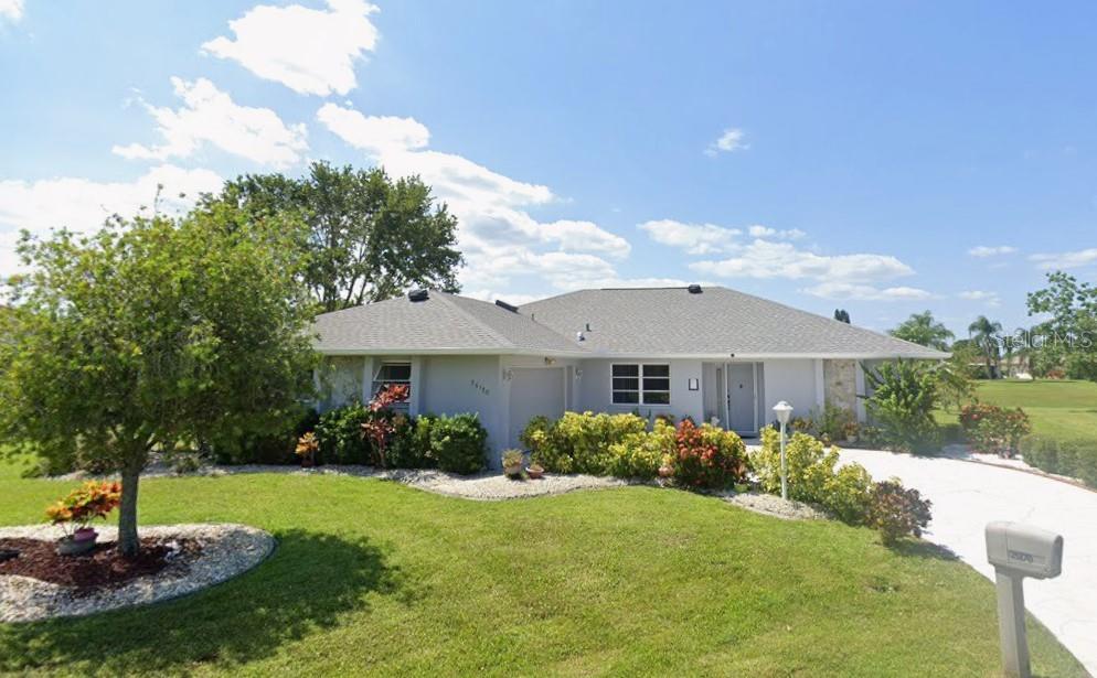 Single Family Residence em PUNTA GORDA, FL - Daniel Dourado