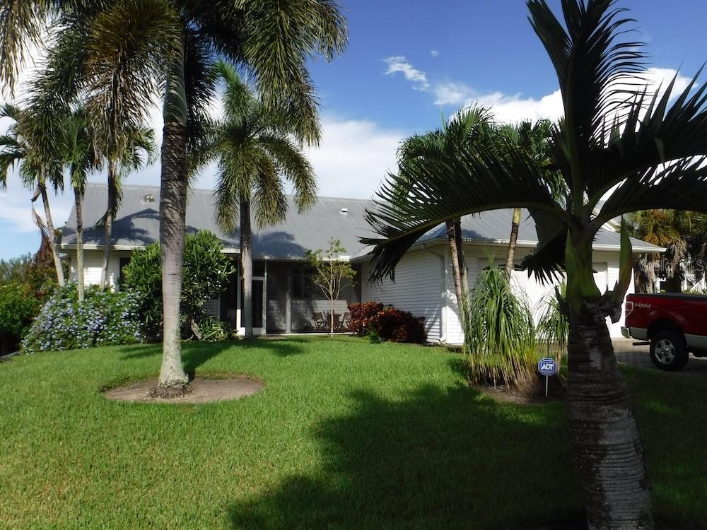 Single Family Residence em BOKEELIA, FL - Daniel Dourado