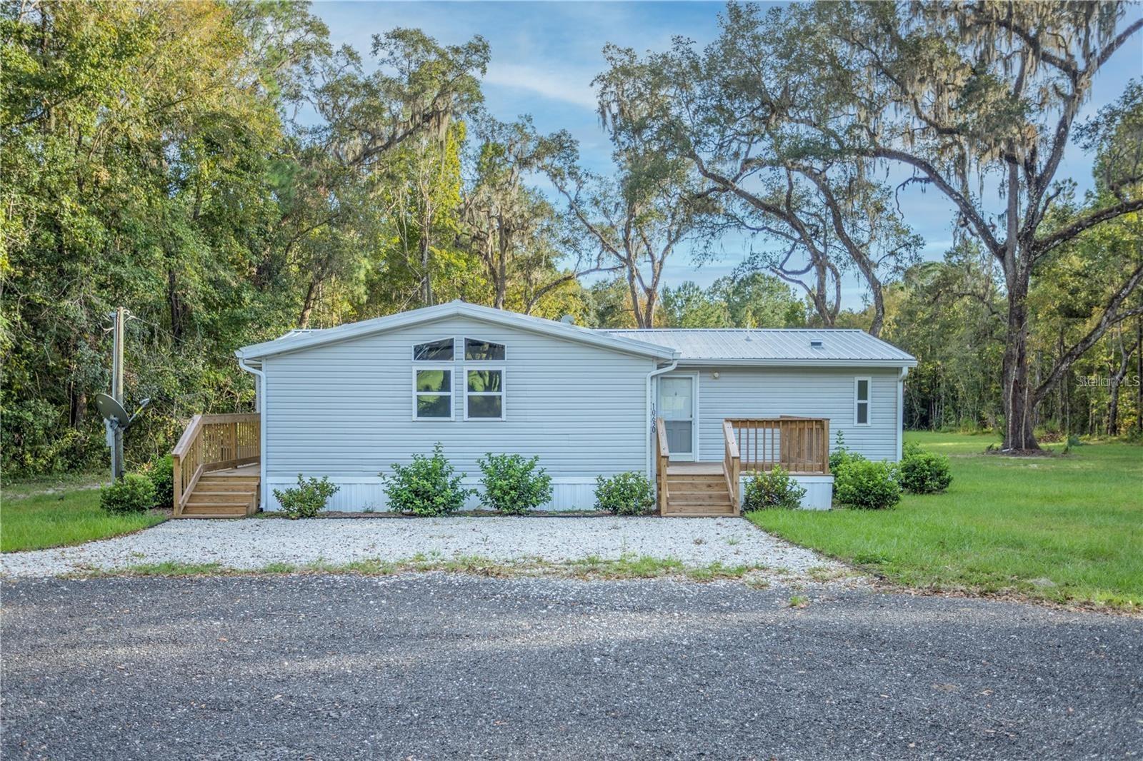 Manufactured Home in MICANOPY, FL - Daniel Dourado