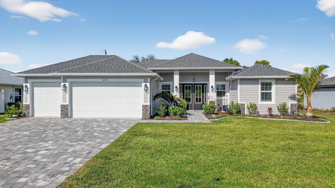 Single Family Residence em PUNTA GORDA, FL - Daniel Dourado