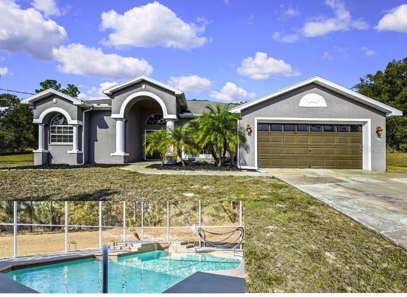 Single Family Residence em SPRING HILL, FL - Daniel Dourado