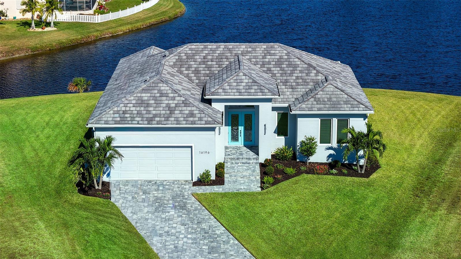 Single Family Residence em PUNTA GORDA, FL - Daniel Dourado