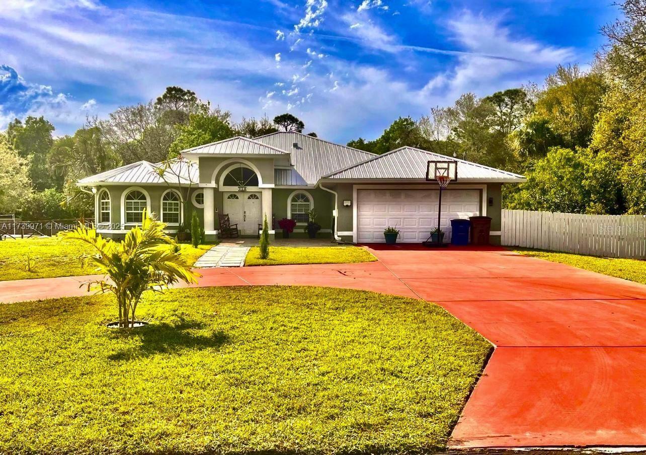 Single Family Residence in LEHIGH ACRES, FL - Daniel Dourado