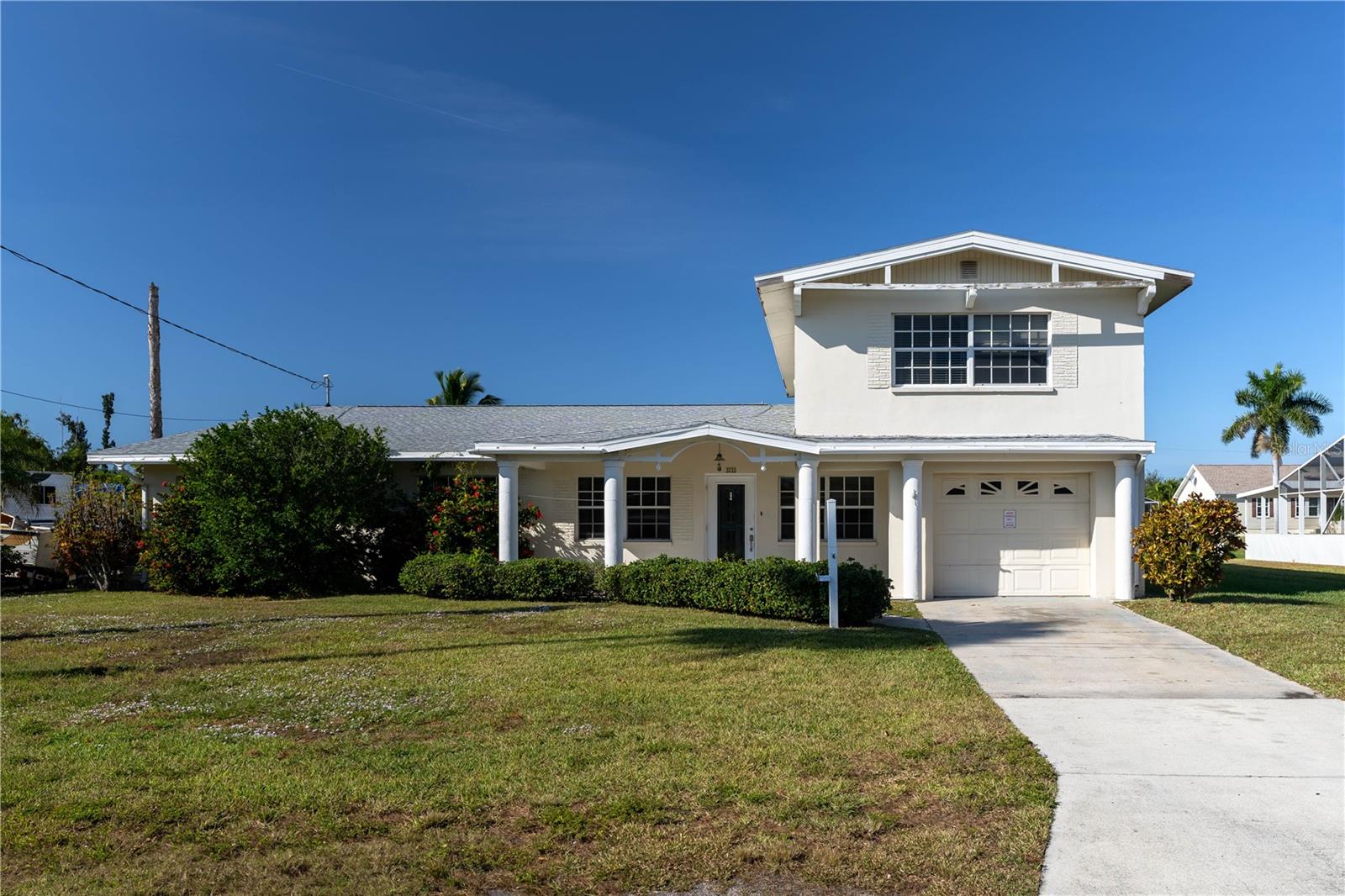 Single Family Residence em PUNTA GORDA, FL - Daniel Dourado