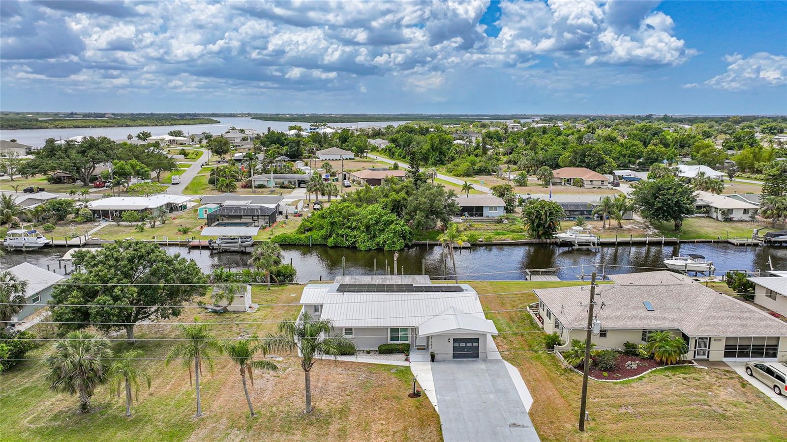 Single Family Residence em PUNTA GORDA, FL - Daniel Dourado