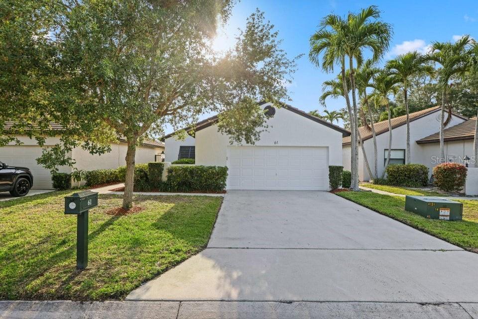 Single Family Residence in PALM BEACH GARDENS, FL - Daniel Dourado