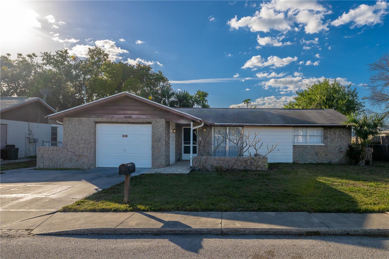 Single Family Residence em PORT RICHEY, FL - Daniel Dourado