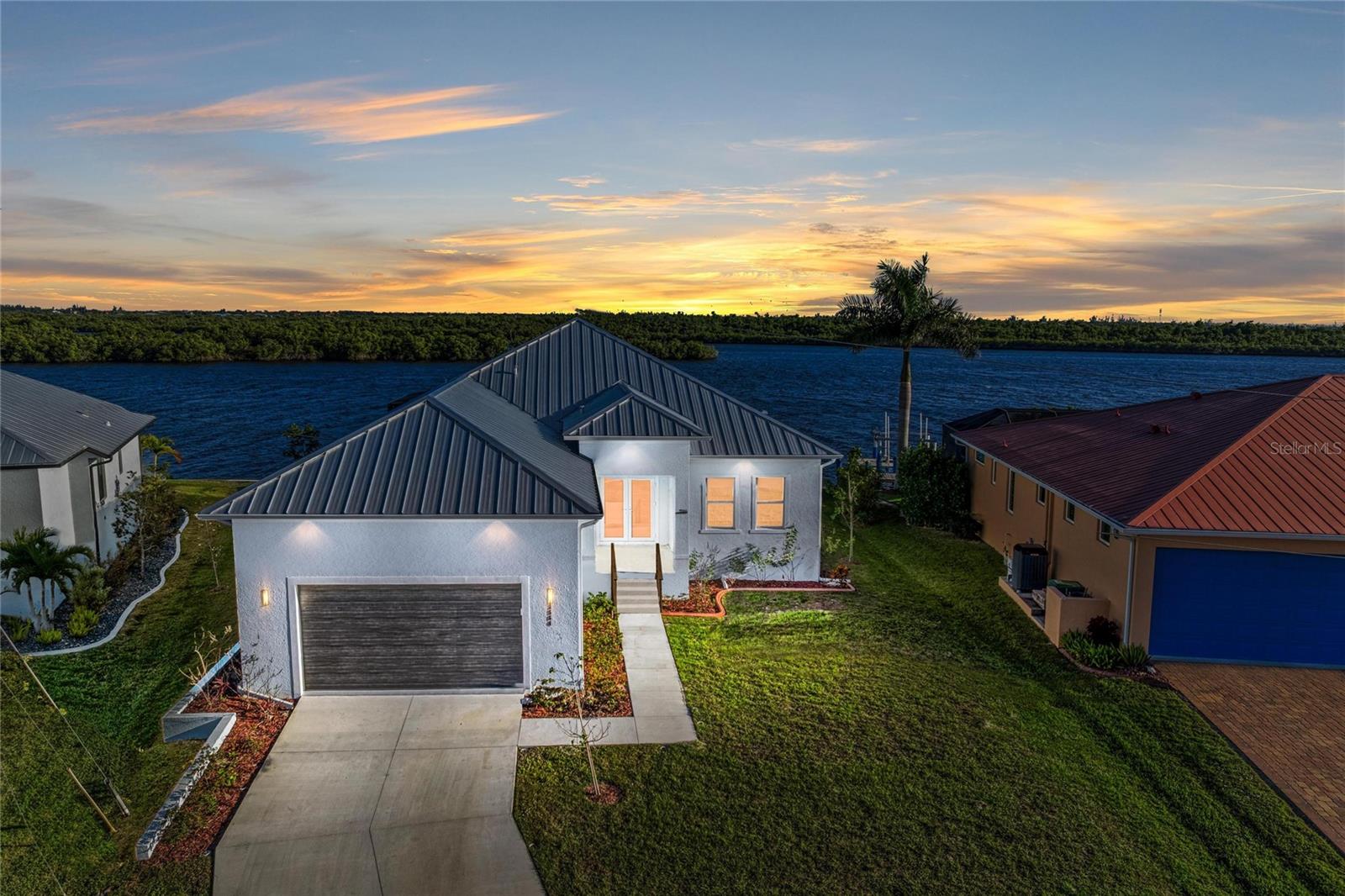 Single Family Residence em PUNTA GORDA, FL - Daniel Dourado