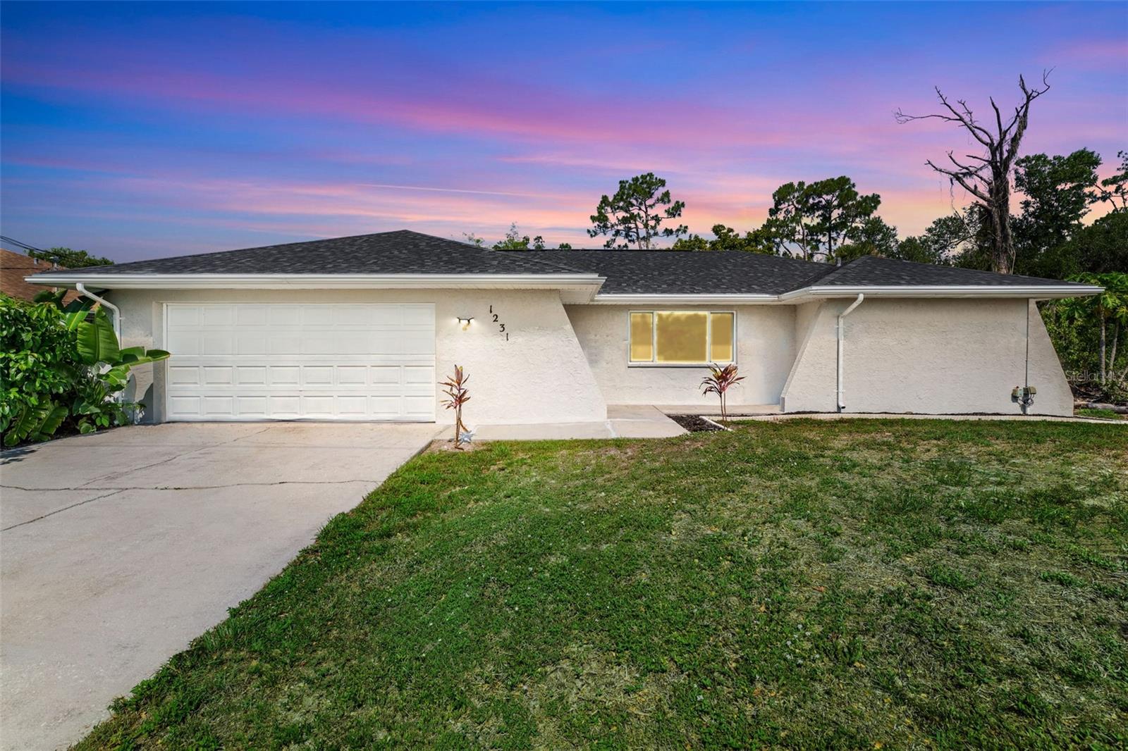 Single Family Residence em PORT CHARLOTTE, FL - Daniel Dourado