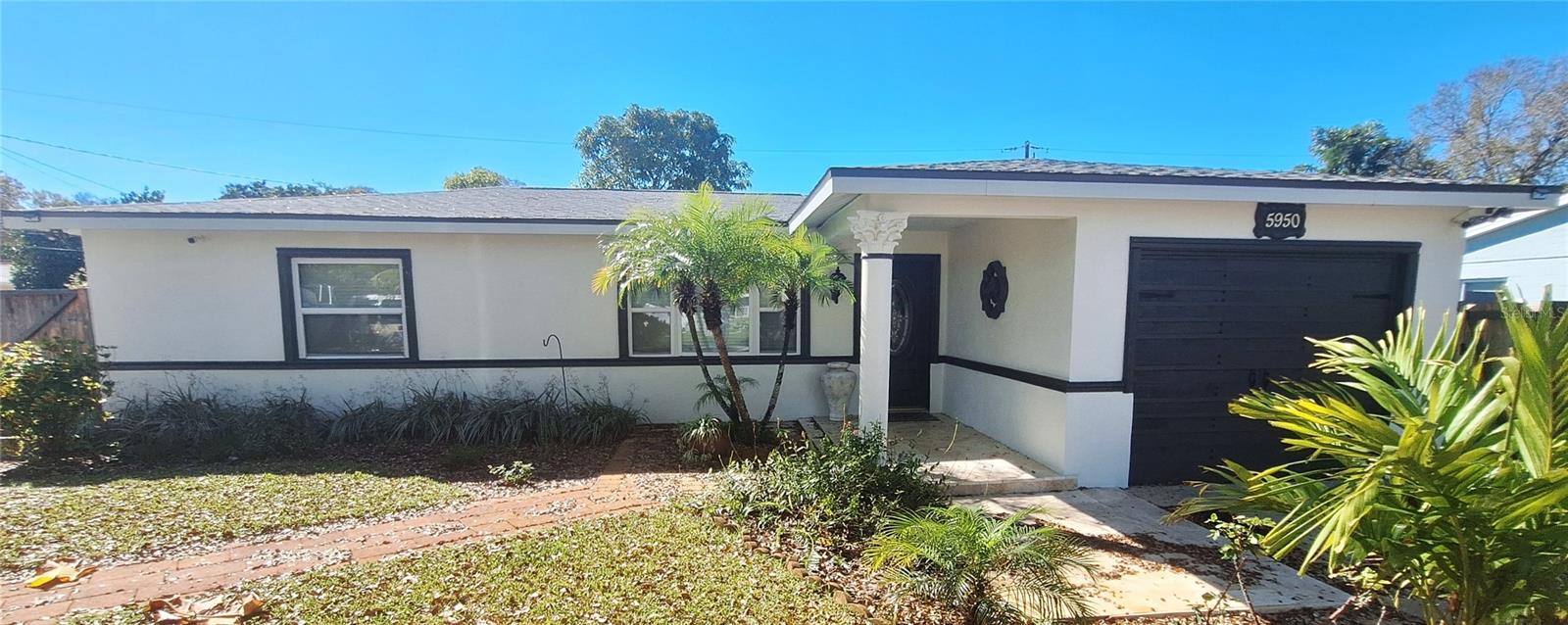 Single Family Residence em KENNETH CITY, FL - Daniel Dourado